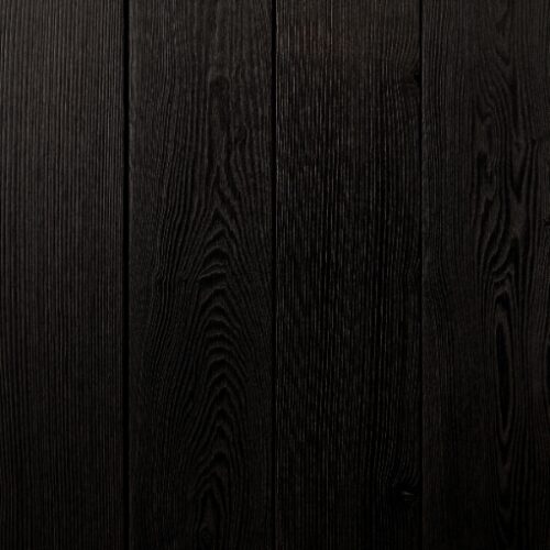 ThermoWood® Ash cladding timber with a wire brushed texture and finished in MillCoat® Charcoal Black colour, from Millworks Ltd.