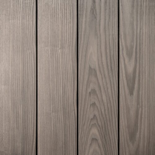 ThrermoWood® Ash cladding timber, wire brushed and factory coated with OrganoWood® surface treatment for consistent weathering, from Millworks Ltd.