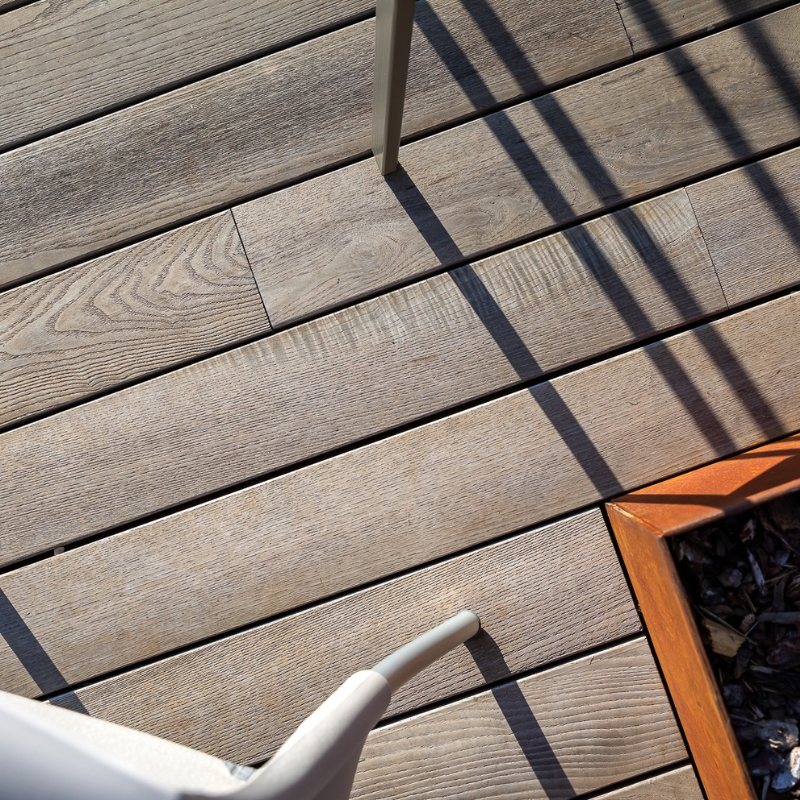 Close up of Millworks ThermoWood Ash decking boards.