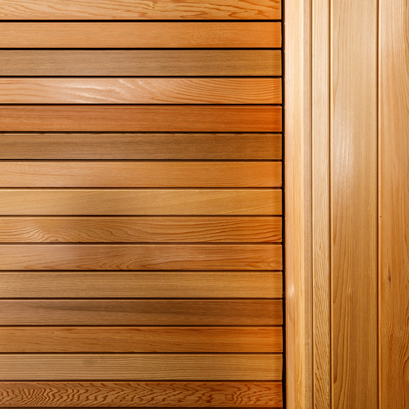 Cedar clad wall showing vertical and horizontal cladding