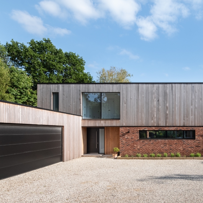 MillworksLtd_FarnhamHouse-WeatheredCedarCladding Tongue and groove timber cladding shown in Western Red Cedar on Millworks Farnham House.