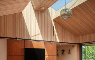 Interior wall and ceiling cladding shown in a whitewash finish.