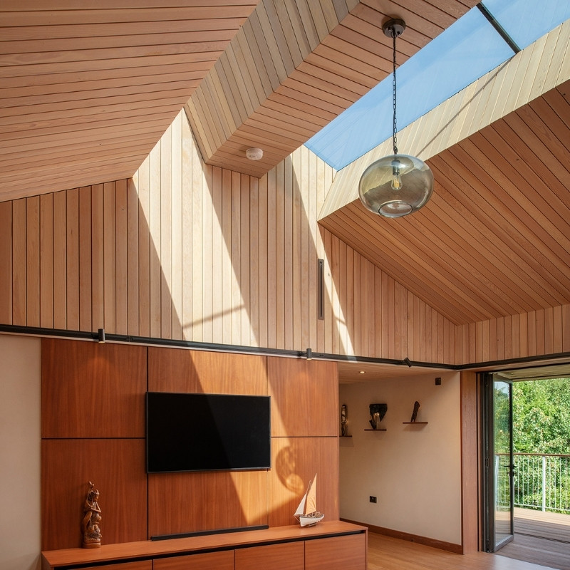 Interior wall and ceiling cladding shown in a whitewash finish.