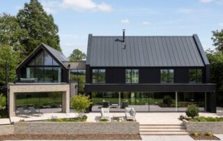 Modern Farmstead inspired home with black timber cladding.