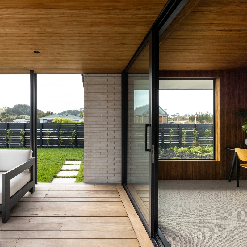 MillworksLtd_Abodo_JonoParker_AbodoVulcan_SoffitTimberCladding Abodo Vulcan ceiling cladding blending into covered outdoor soffit area.