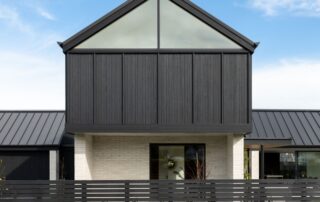Pitched gable end finished in black Abodo Vulcan timber. cladding.