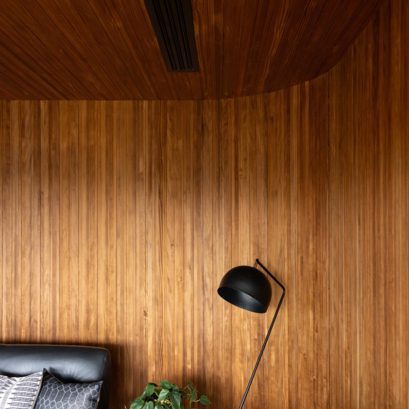 MillworksLtd_Abodo_JonoParker_InteriorCladding Curved ceiling with timber cladding that continues across walls.