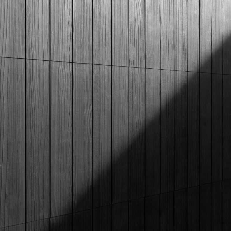Close up of Abodo Vulcan vertical grain cladding.